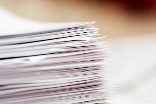 stack of papers for Contractor Certificate of Insurance Tracking